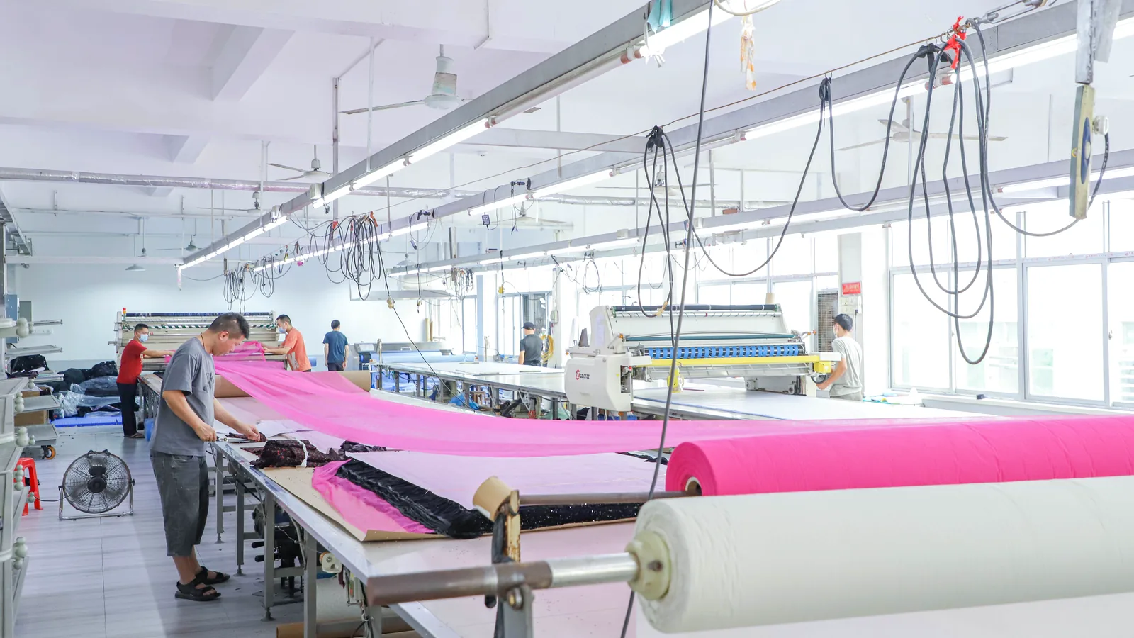 Fabric spreading and cutting process at Shengfu garment factory