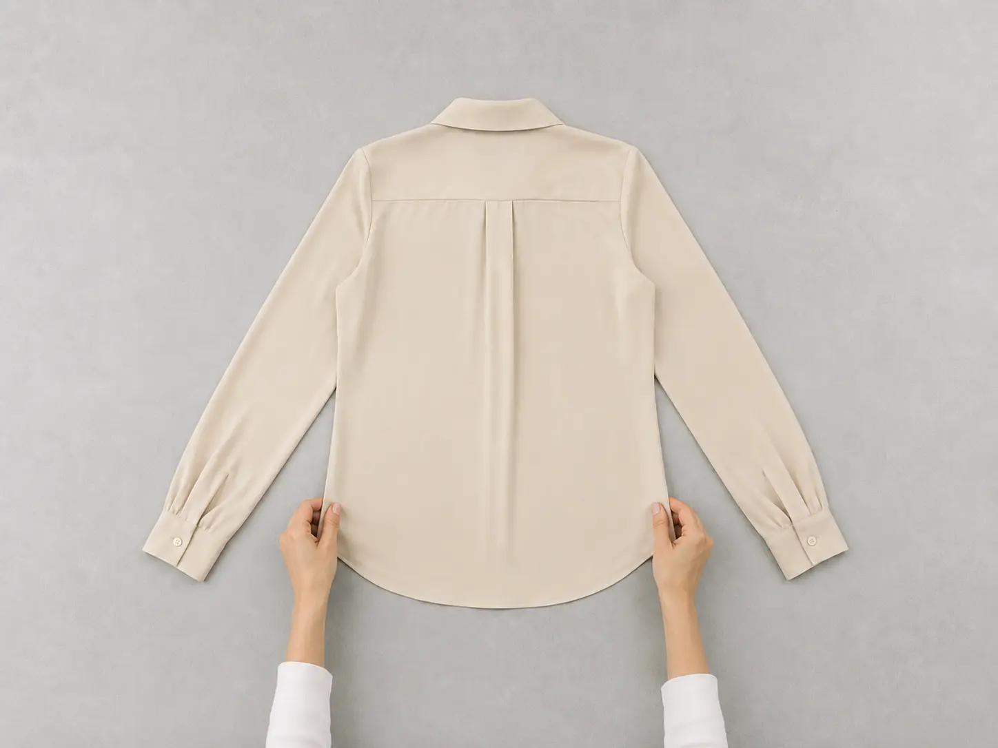 Place the back of the garment facing upward