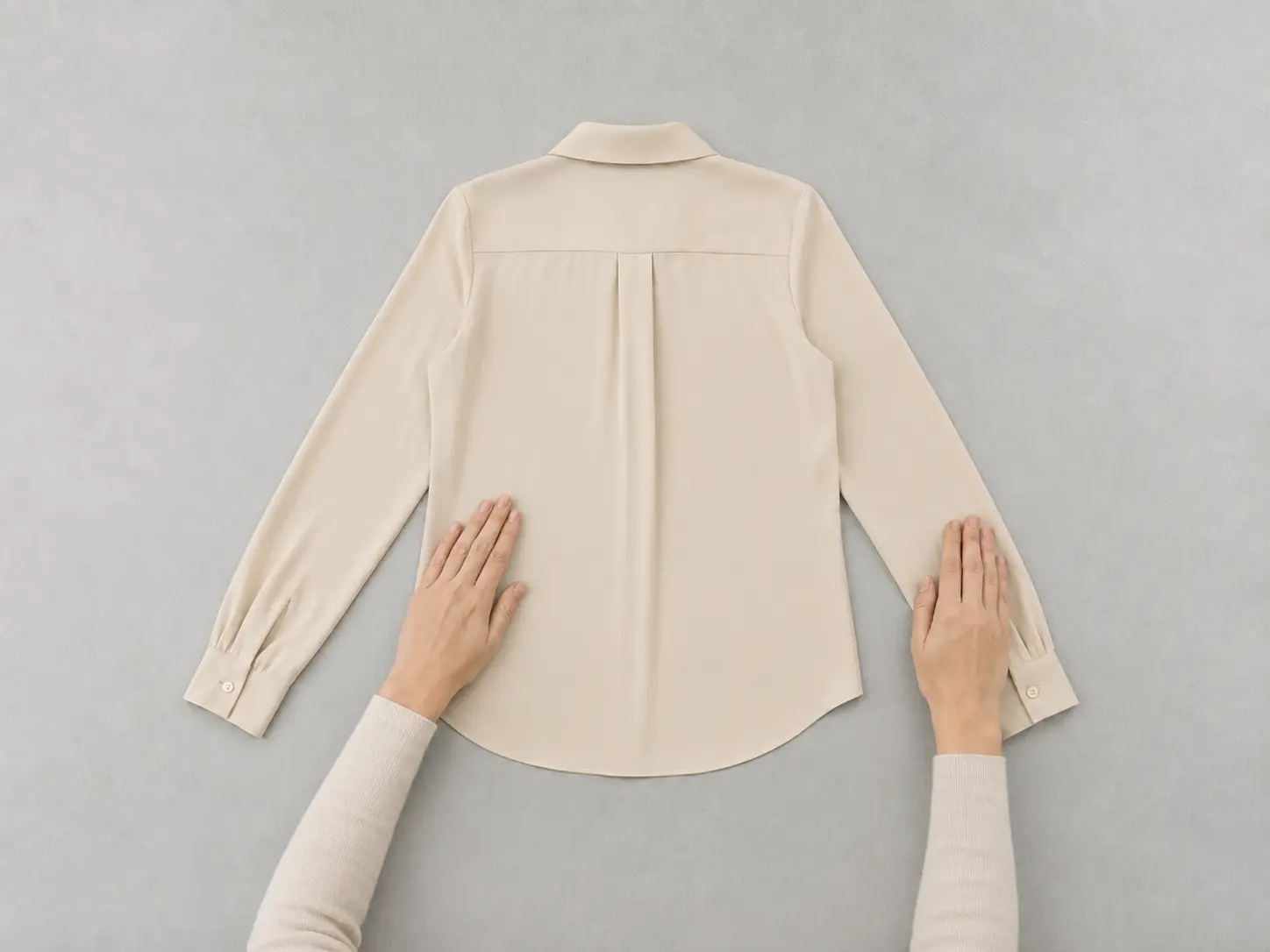 Smooth the fabric naturally without pulling it