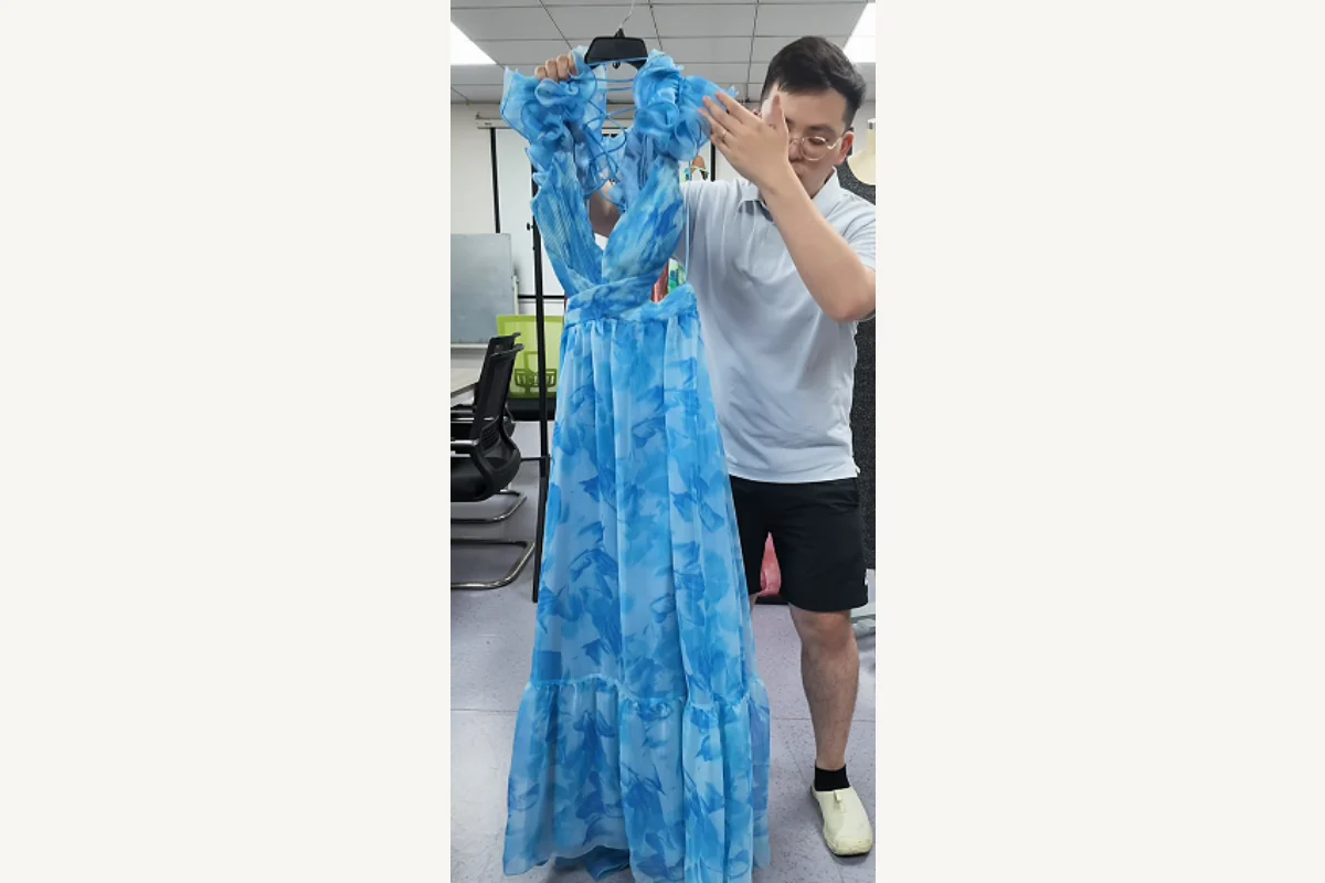 Shengfu womenswear developer comparing dress length and dress fit on a blue maxi dress