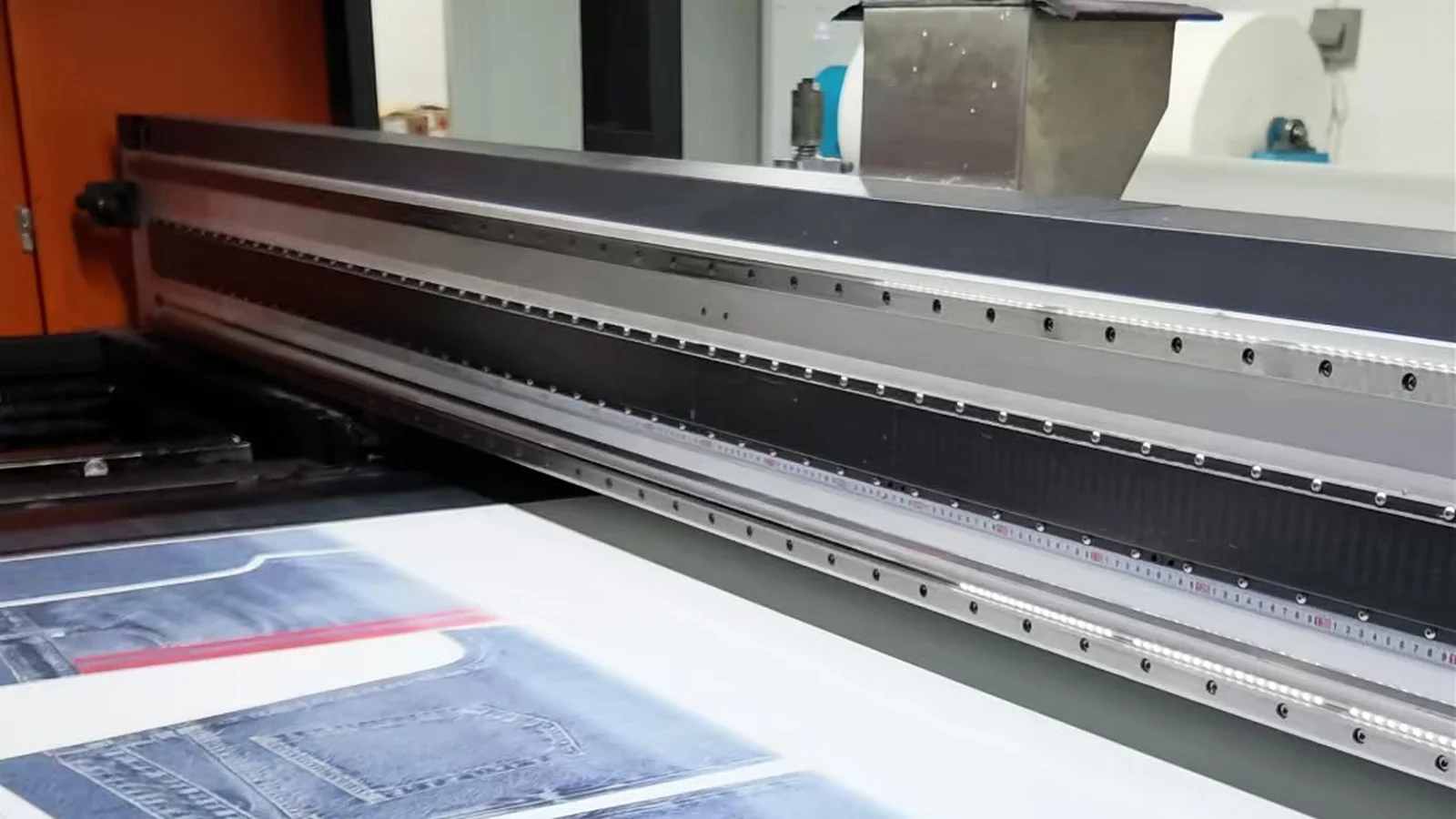 Wide-format textile printer producing a denim-look fabric pattern
