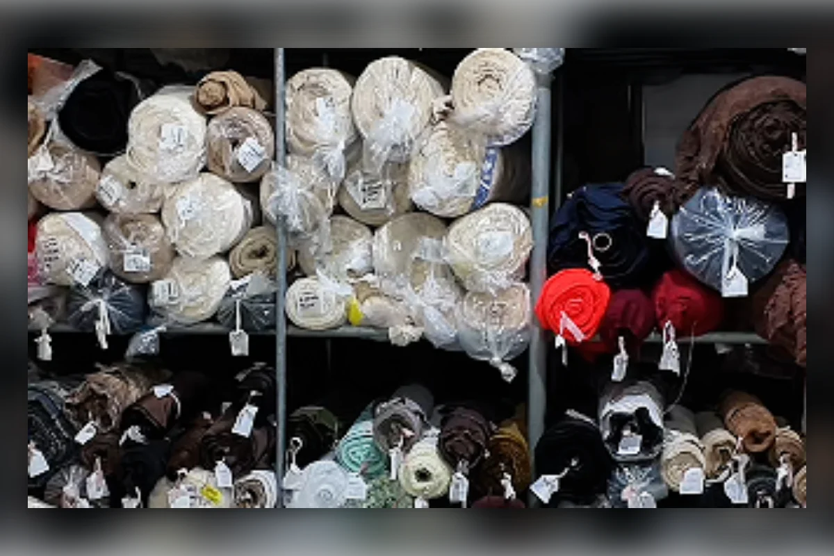 Shelves of fabric rolls representing separate colour and material minimums