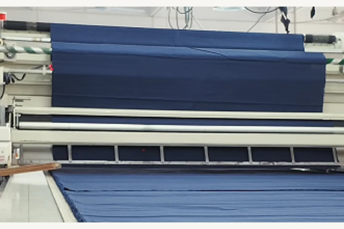 Fabric spreading equipment used to plan efficient garment production quantities