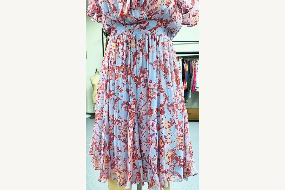 Close view of floral dress waist placement affecting overall proportions and fit