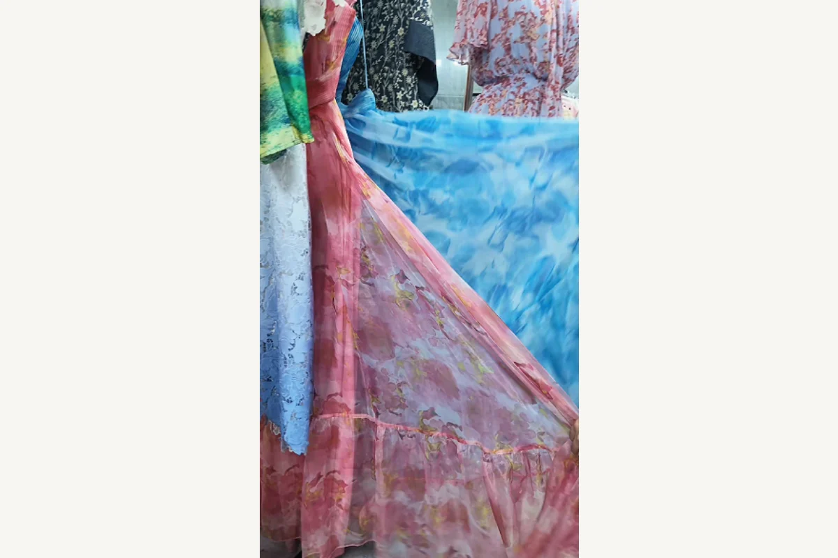 Two dress fabrics compared to show how drape changes dress fit and silhouette