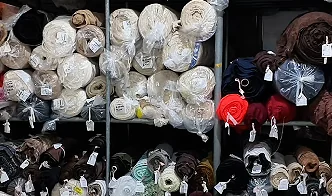 Rolls of fabric arranged in a materials area
