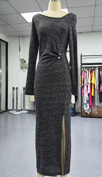 Long dark textured dress on a mannequin