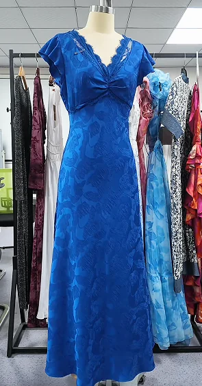 Blue dress sample on a dress form