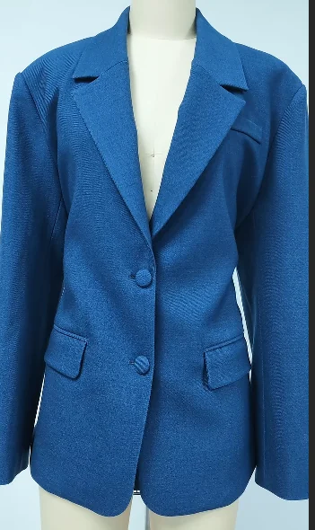 Blue tailored jacket on a dress form