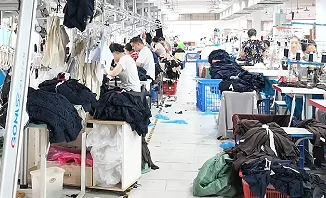 Garment workers at sewing stations