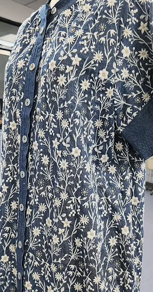 Blue patterned dress with collar and buttons