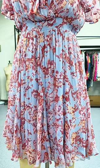 Floral dress with a waist seam on a form