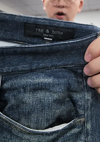 Close-up of a garment waistband and label