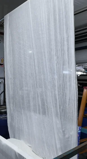 Light pleated fabric hanging vertically