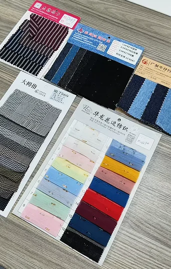 Fabric colour cards and shade references on a table