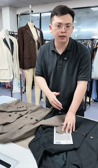 Garment-development review at a sample table