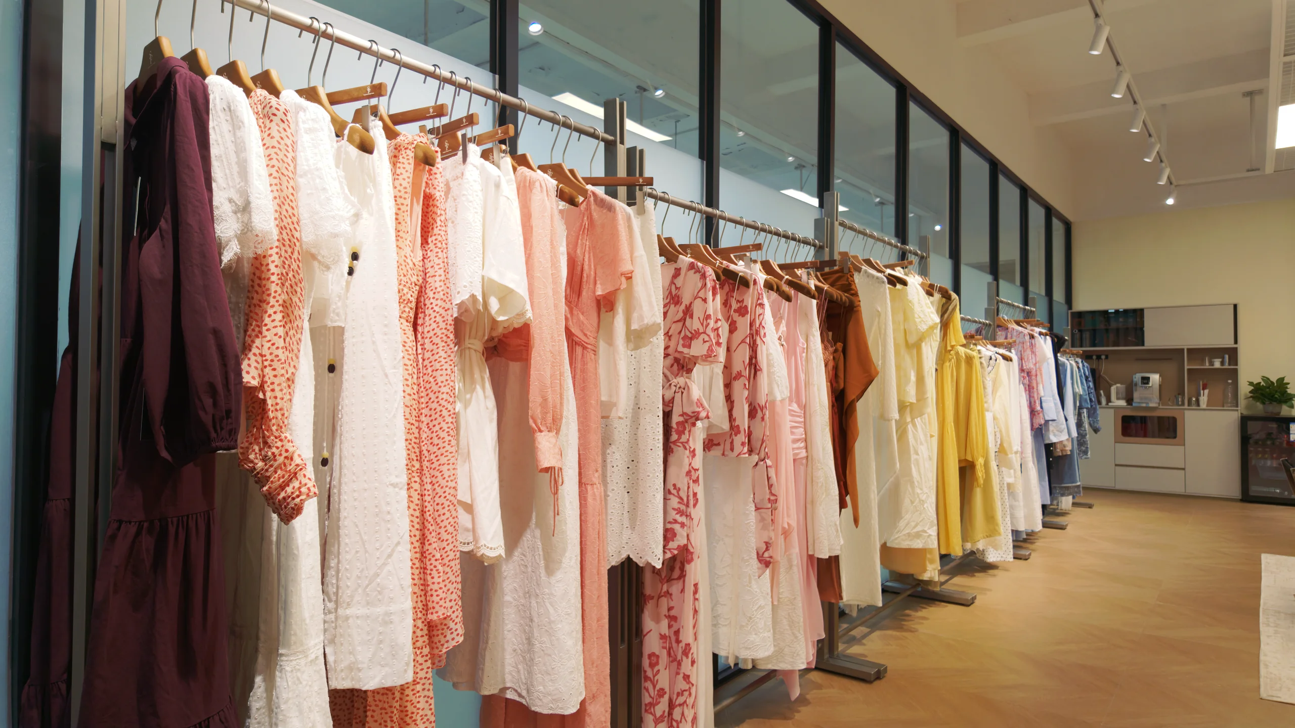 Womenswear and dress samples on display in the Shengfu Textile showroom